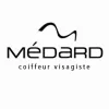 Voici le logo de la marque M C V (MEDARD COIFFURE VISAGISTE) qui représente son identité graphique.