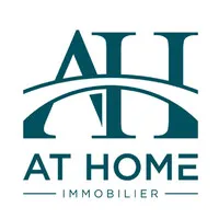 AT HOME IMMOBILIER logo