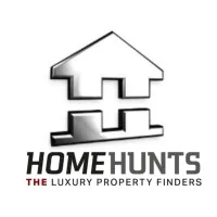 HOME HUNTS logo