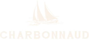 Voici le logo de la marque BENOIT CHARBONNAUD (PRIX - DIVINS. COM) qui représente son identité graphique.