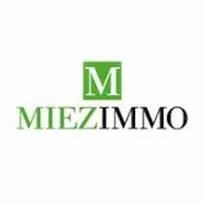 Voici le logo de la marque MIEZIMMO qui représente son identité graphique.