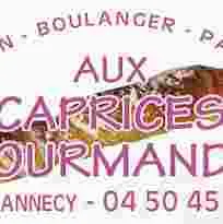 AUX CAPRICES GOURMANDS logo