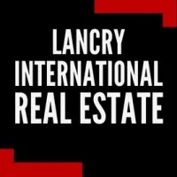 REAL ESTATE logo