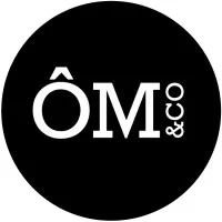OM&CO. logo